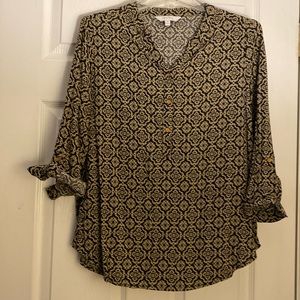 Printed tunic style top. Black and beige. 3/4 sleeves that can roll up or down.